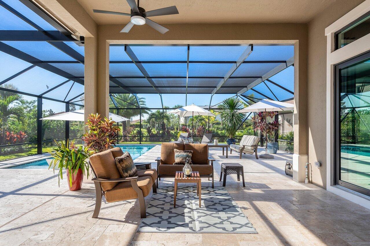 a patio with a patio table and chairs