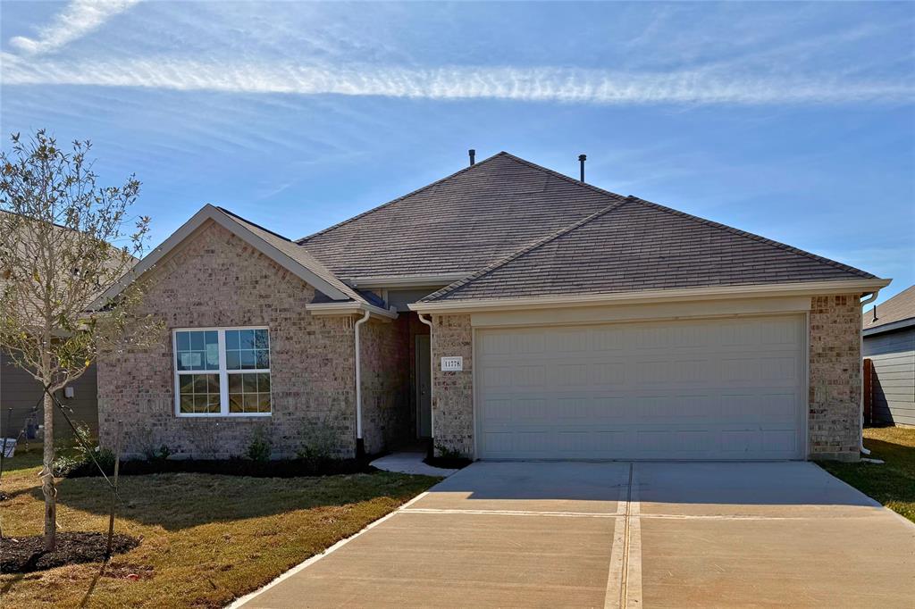 a front view of house with yard