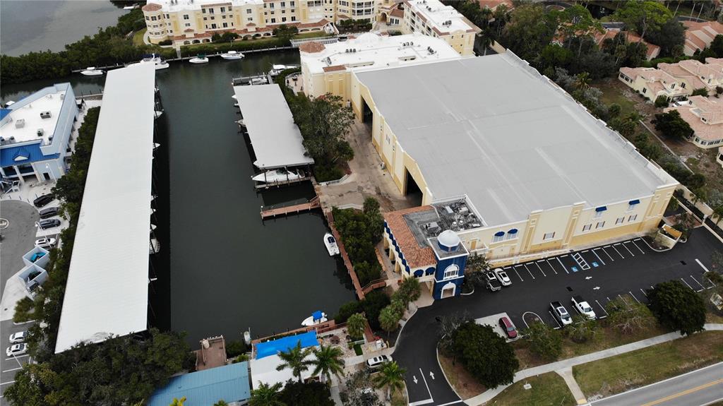 an aerial view of a house with outdoor space