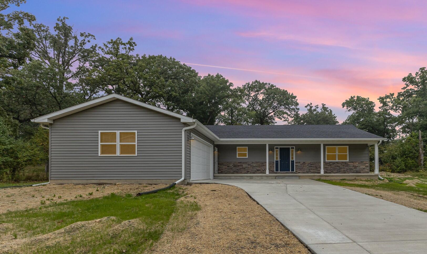 front view of house with a yard