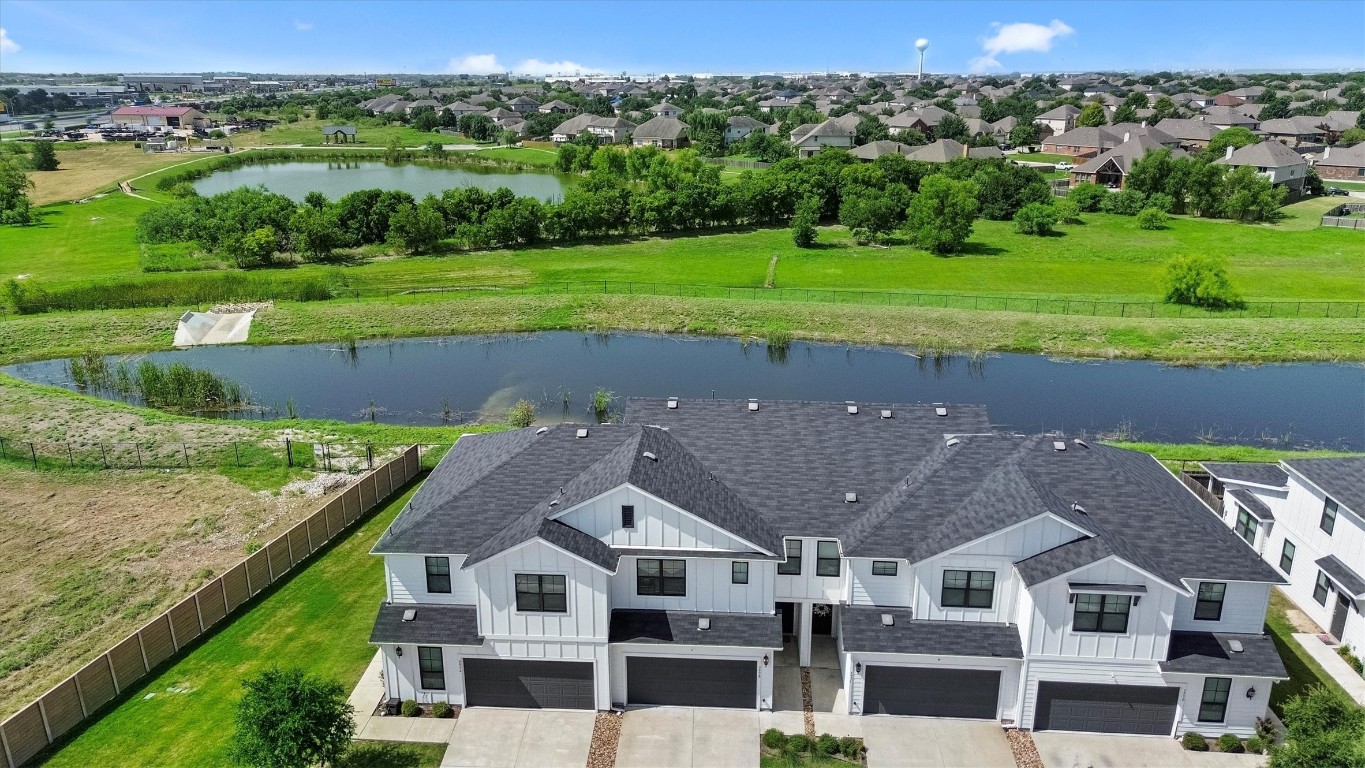 Beautiful Water feature  behind this condo You must view today! Easy to schedule!