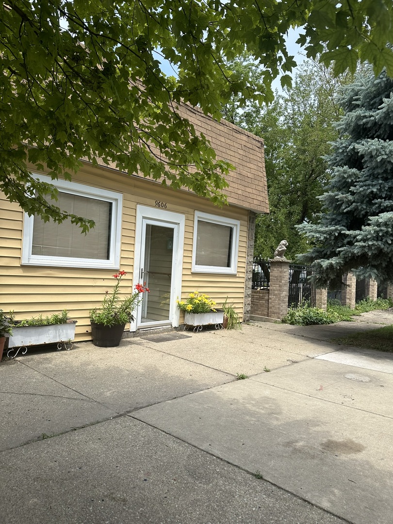 a view of a house with a patio