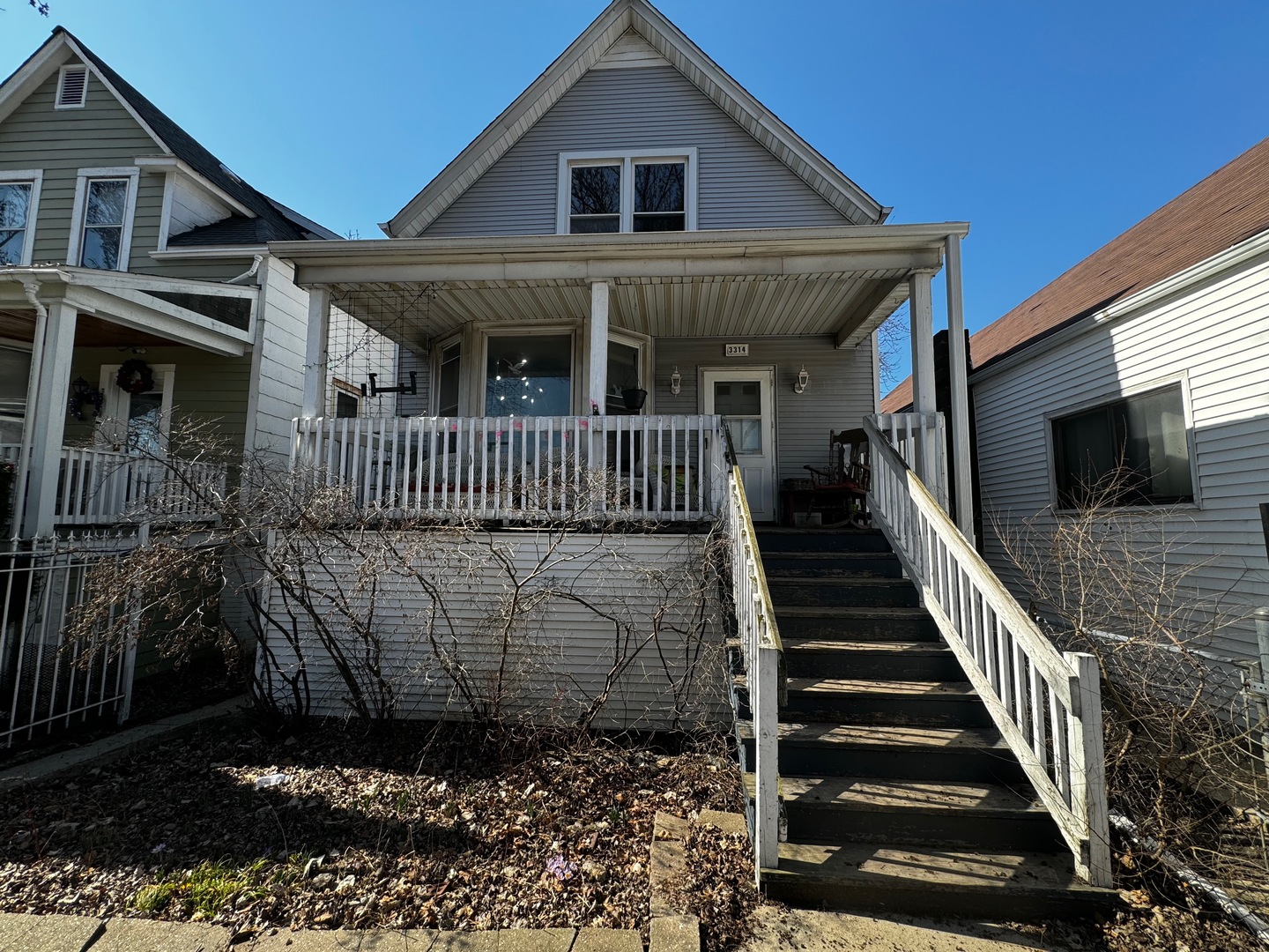 a view of a house with wooden floor and a porch