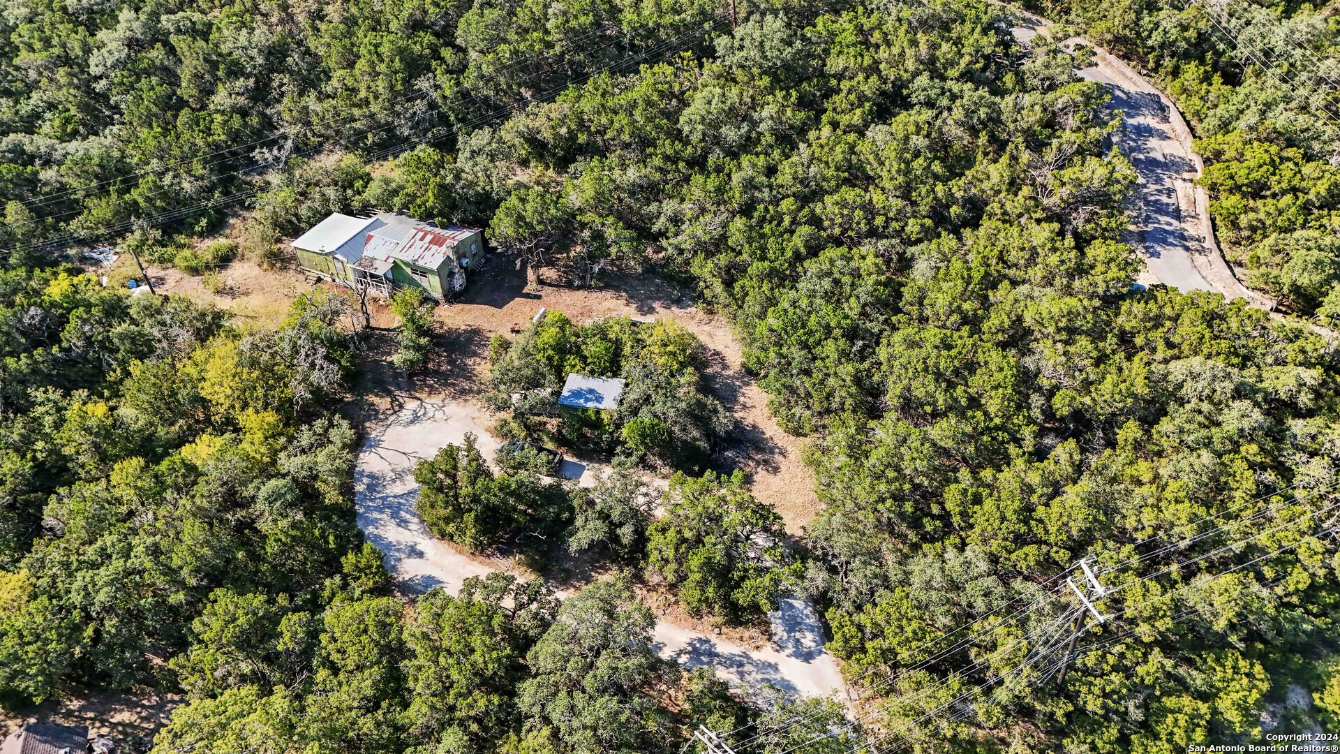 a view of a house with a tree