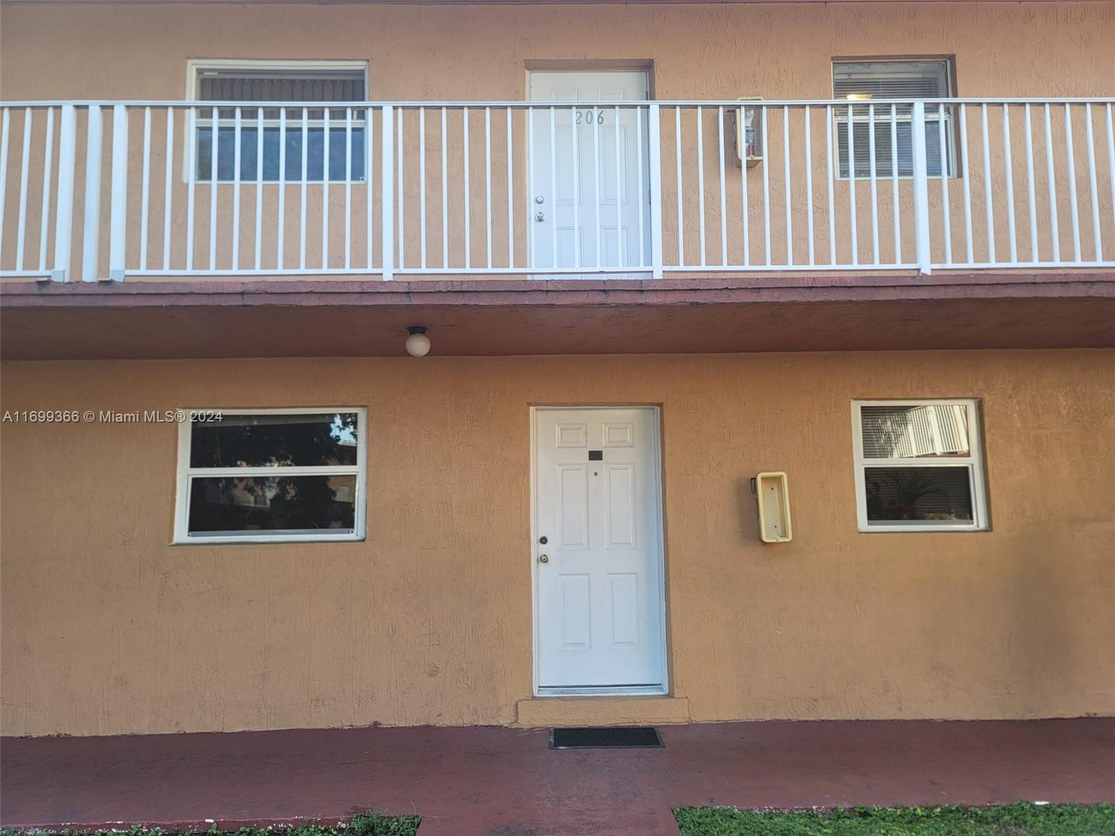 a front view of a house with entryway