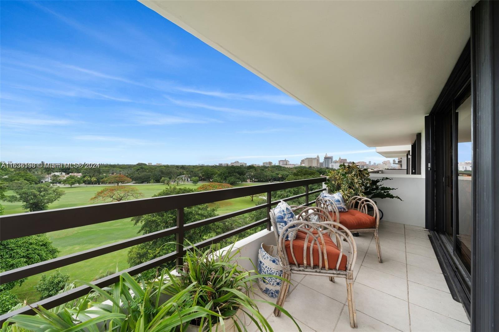 a view of a balcony with chairs