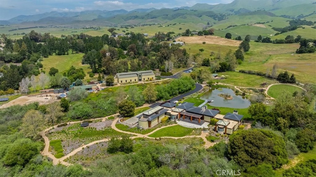 an aerial view of residential house with outdoor space