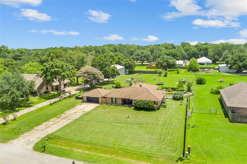 a view of a garden with houses