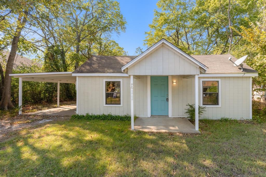 front view of a house and a yard