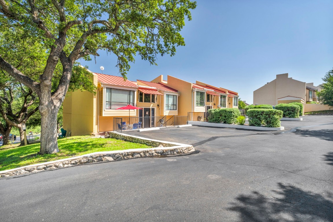 a view of house with outdoor space and street view