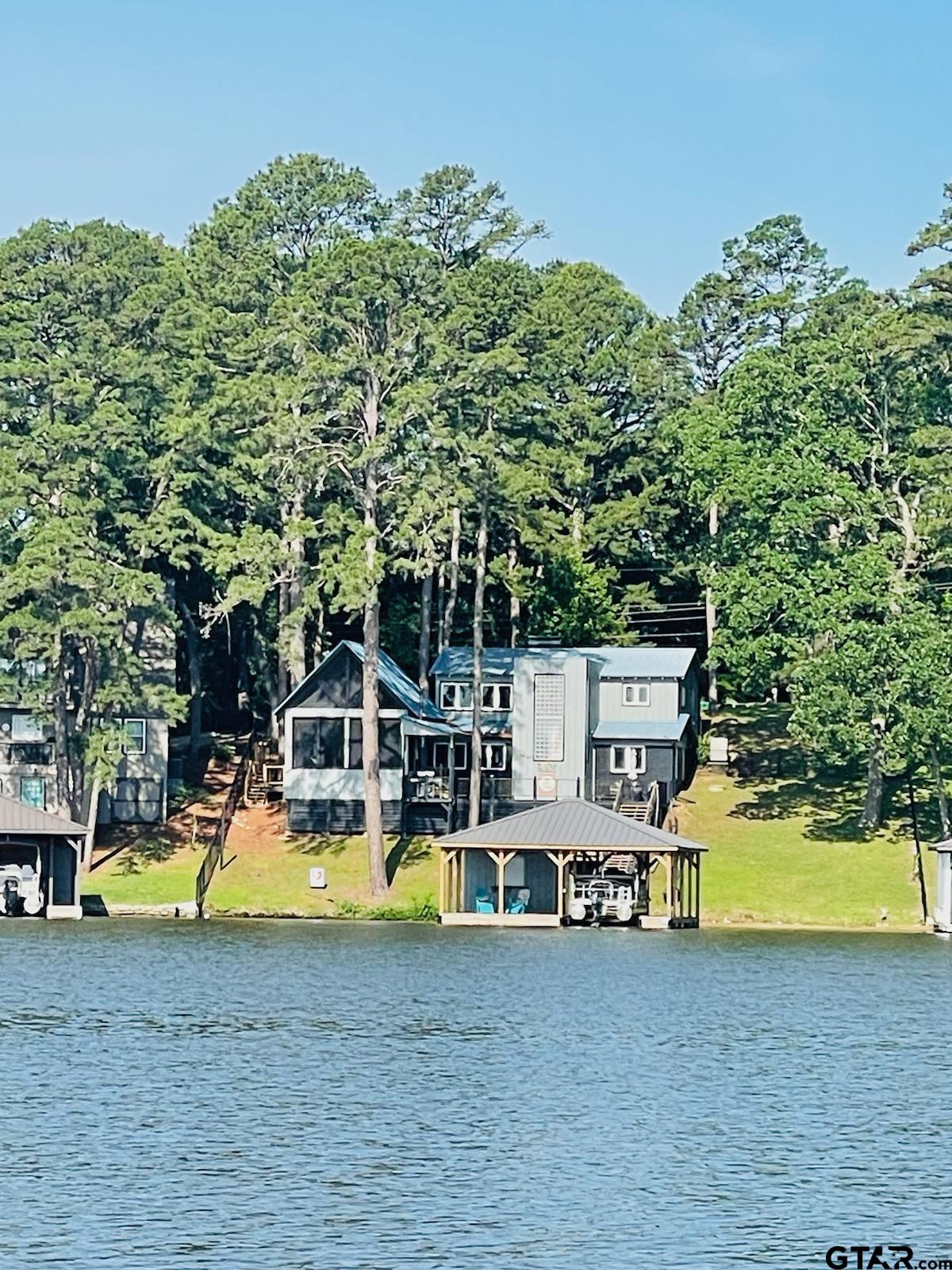 a view of a house with a swimming pool