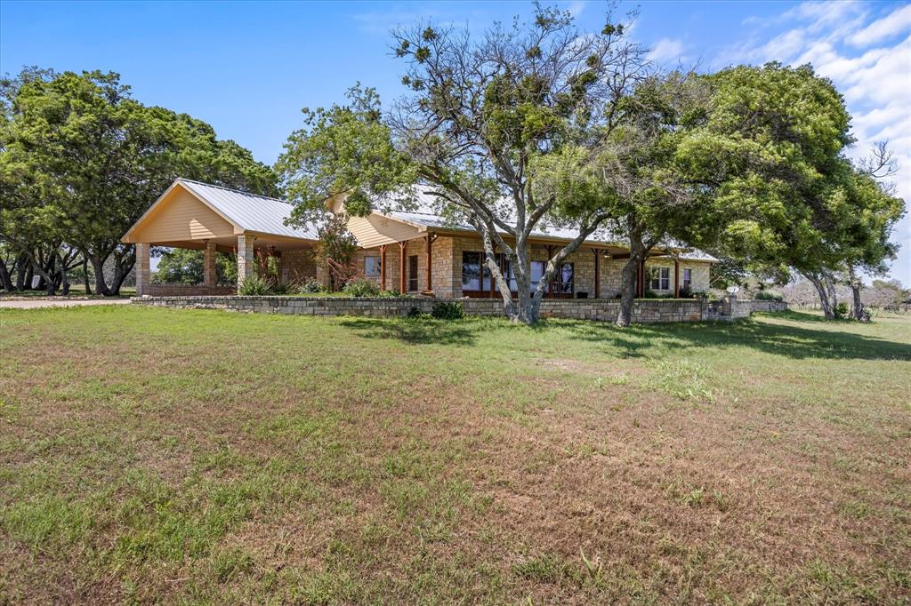 View of front of house featuring a front lawn