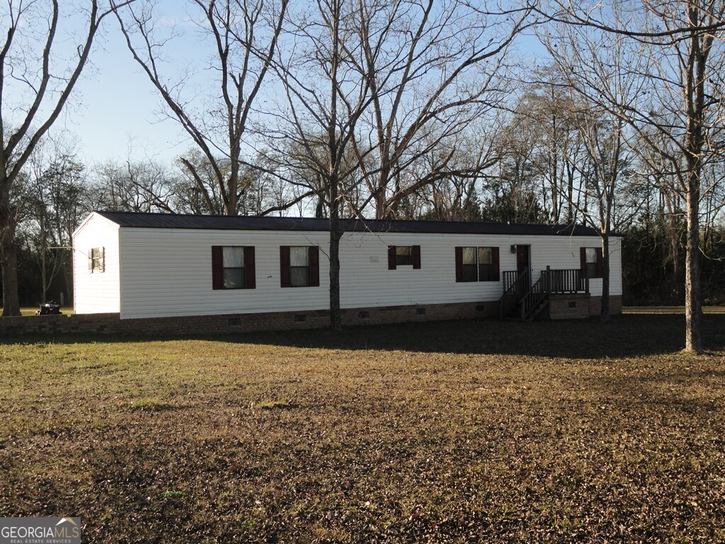 front view of house with a yard