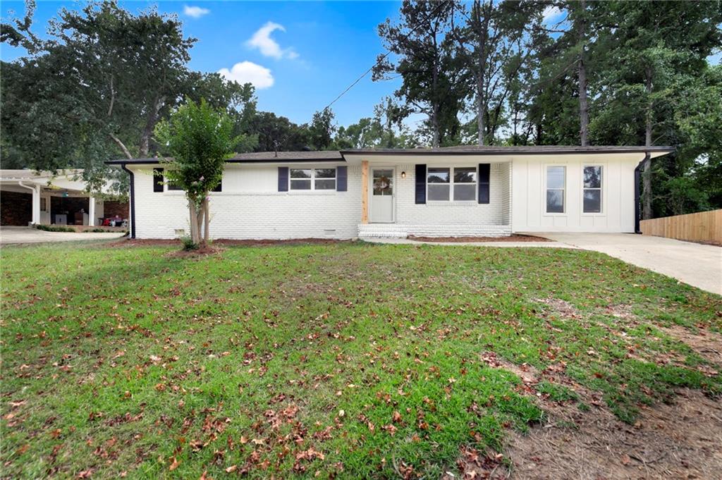 front view of a house with a big yard