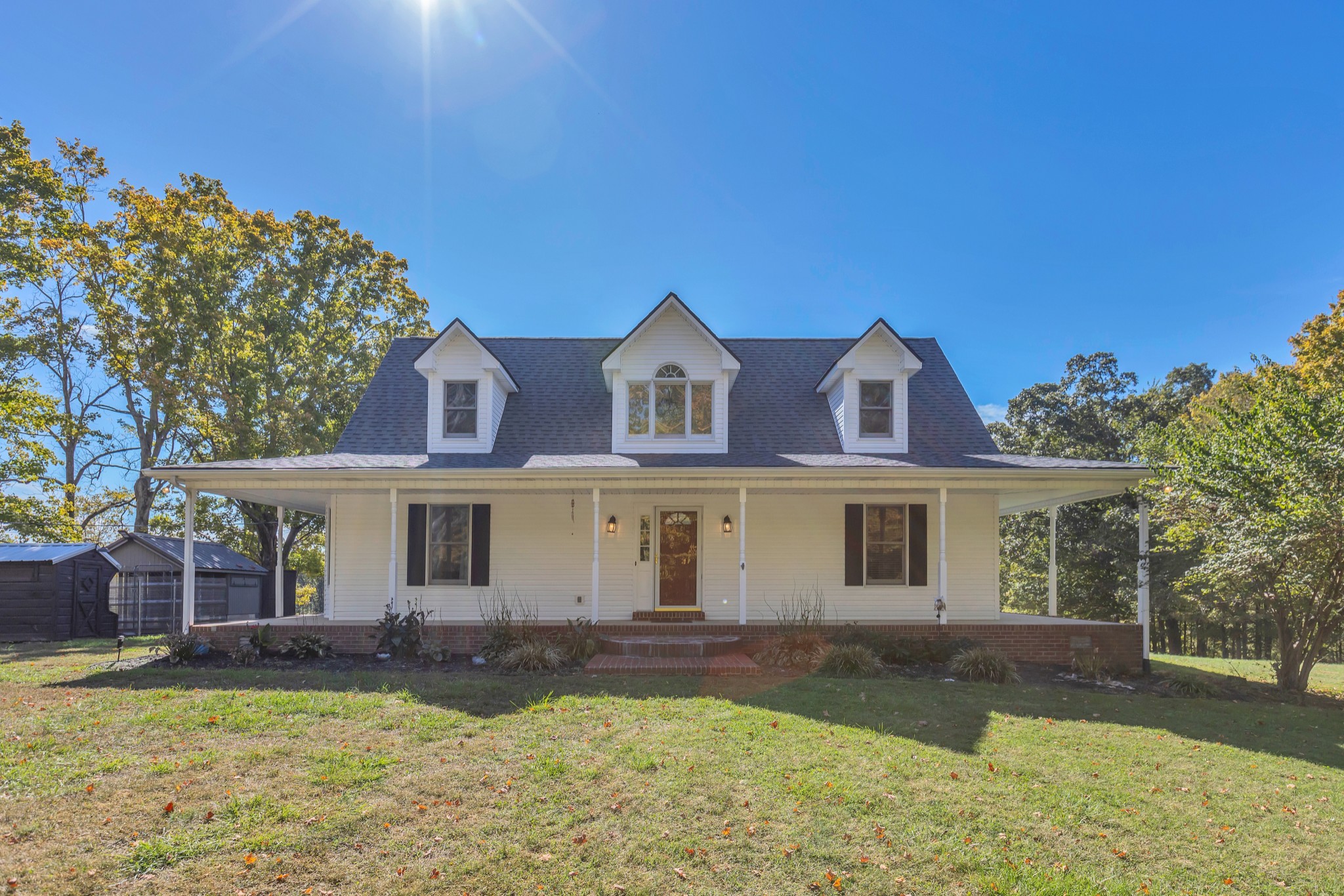 front view of a house with a yard