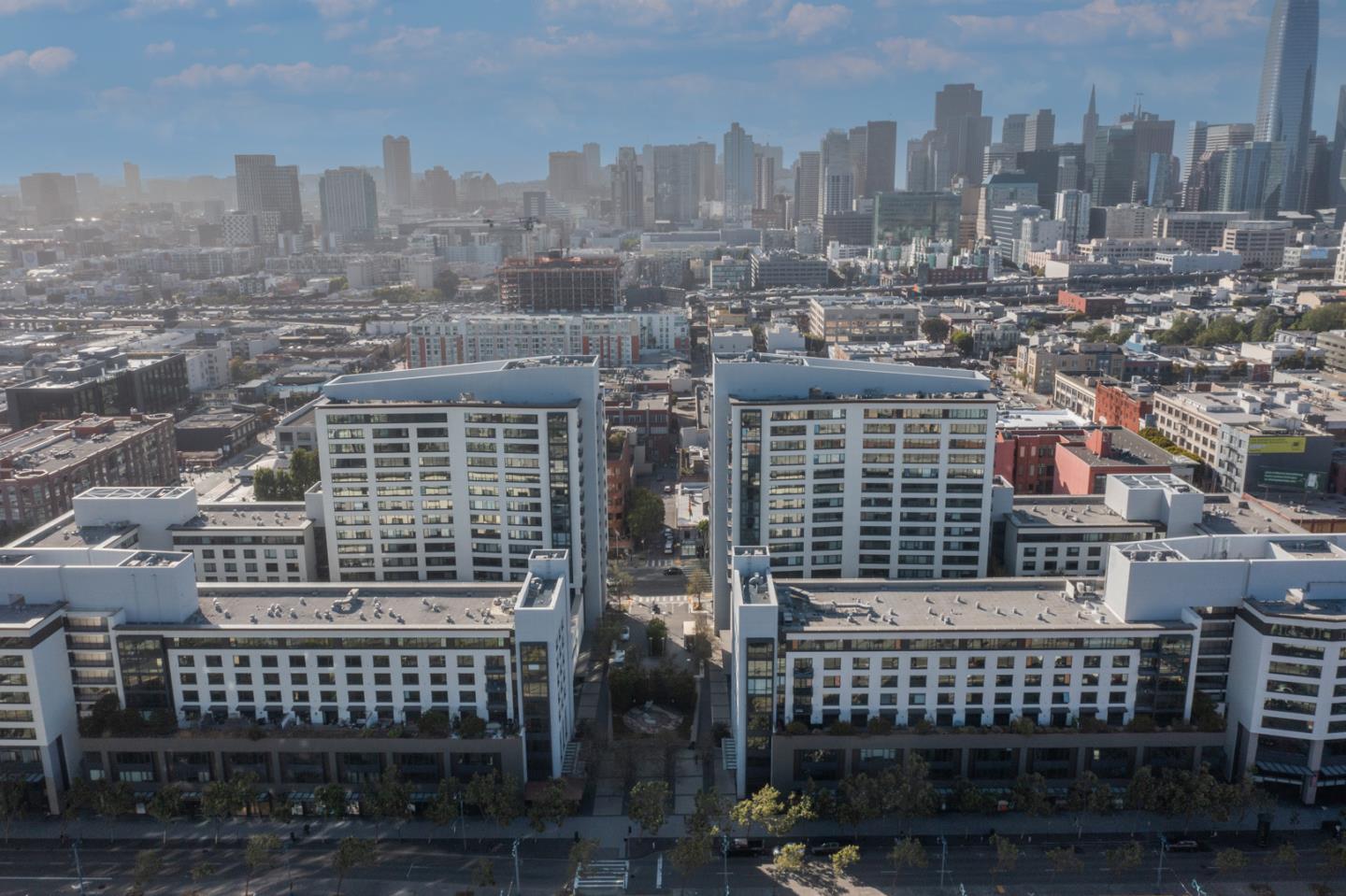 a view of a city with tall buildings