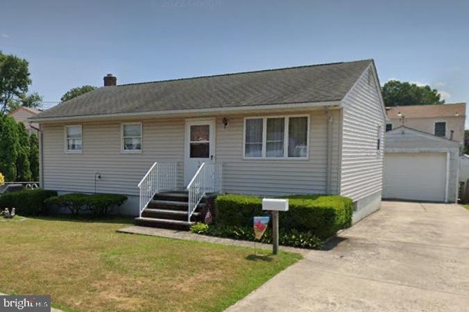 a front view of house with garage