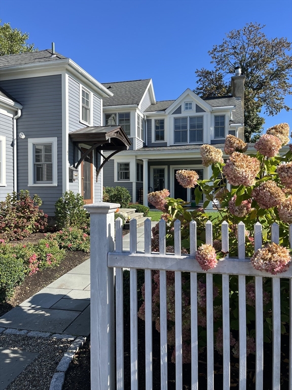 a front view of a house with a porch