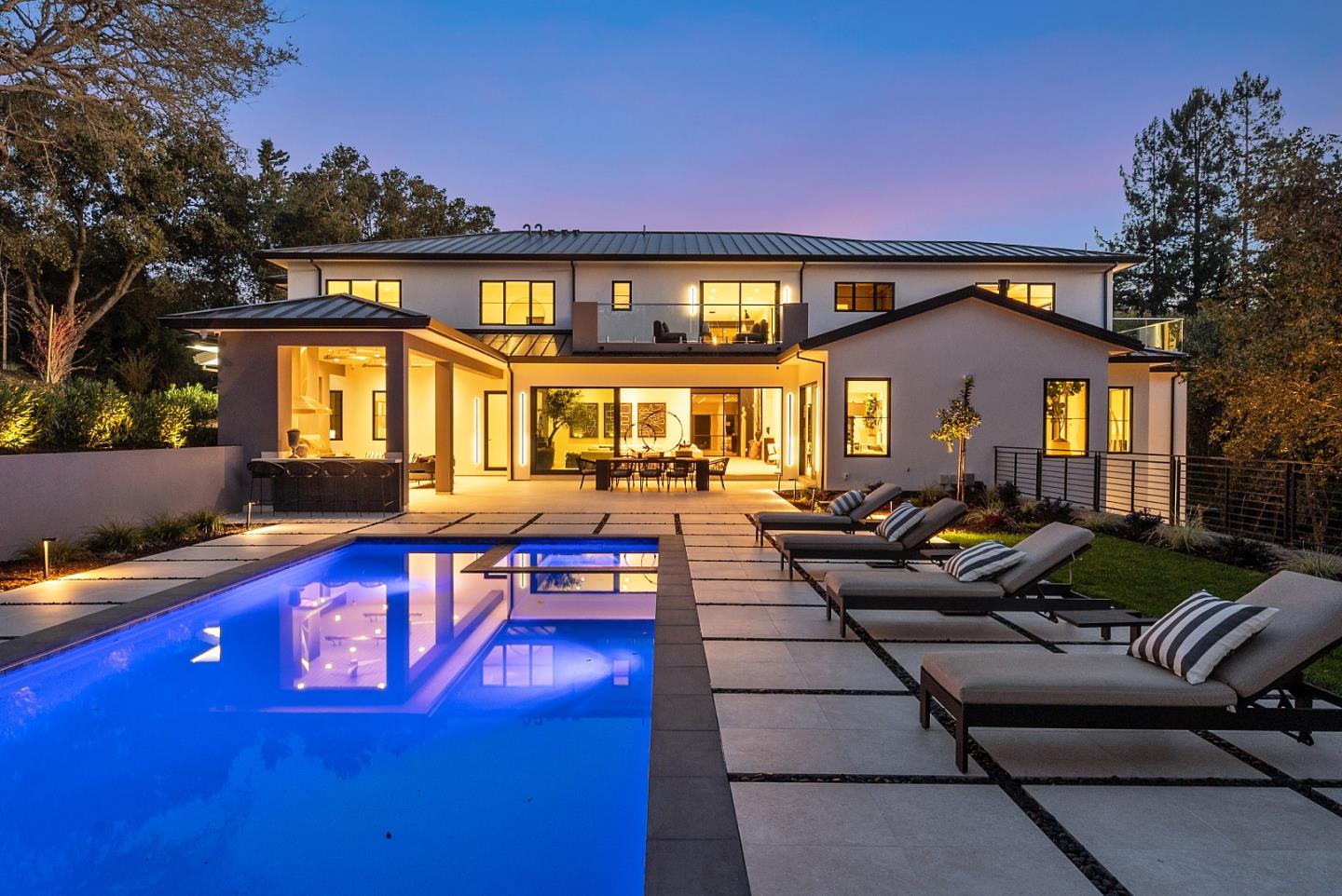 a view of swimming pool with outdoor seating