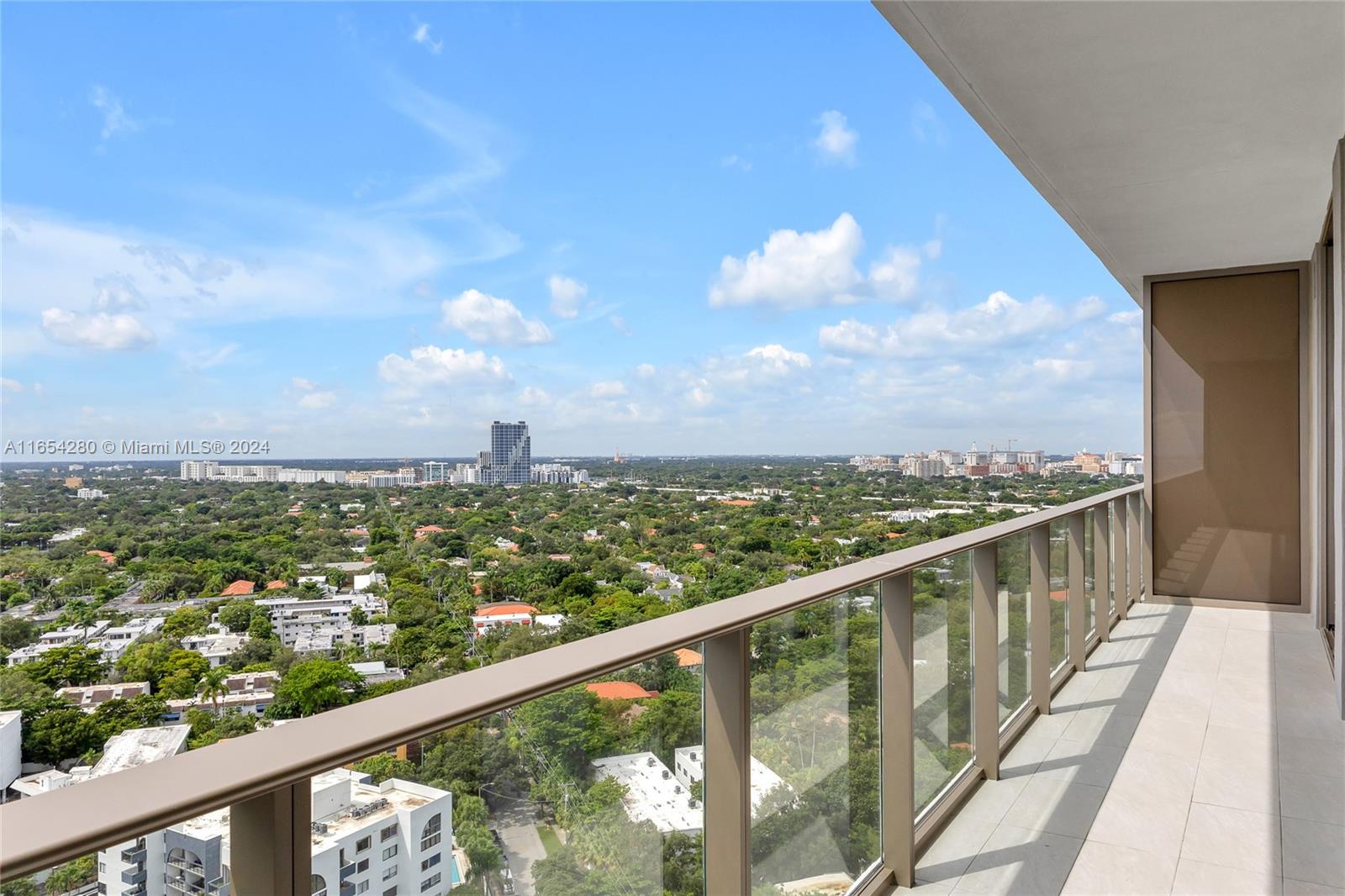 a view of city from a balcony