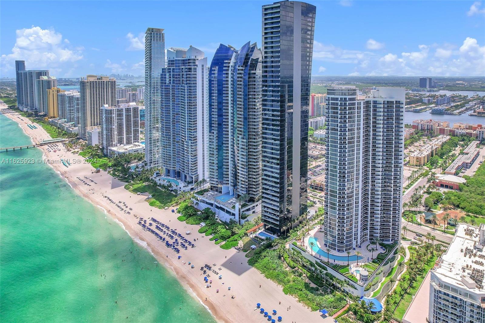 a view of a city with tall buildings