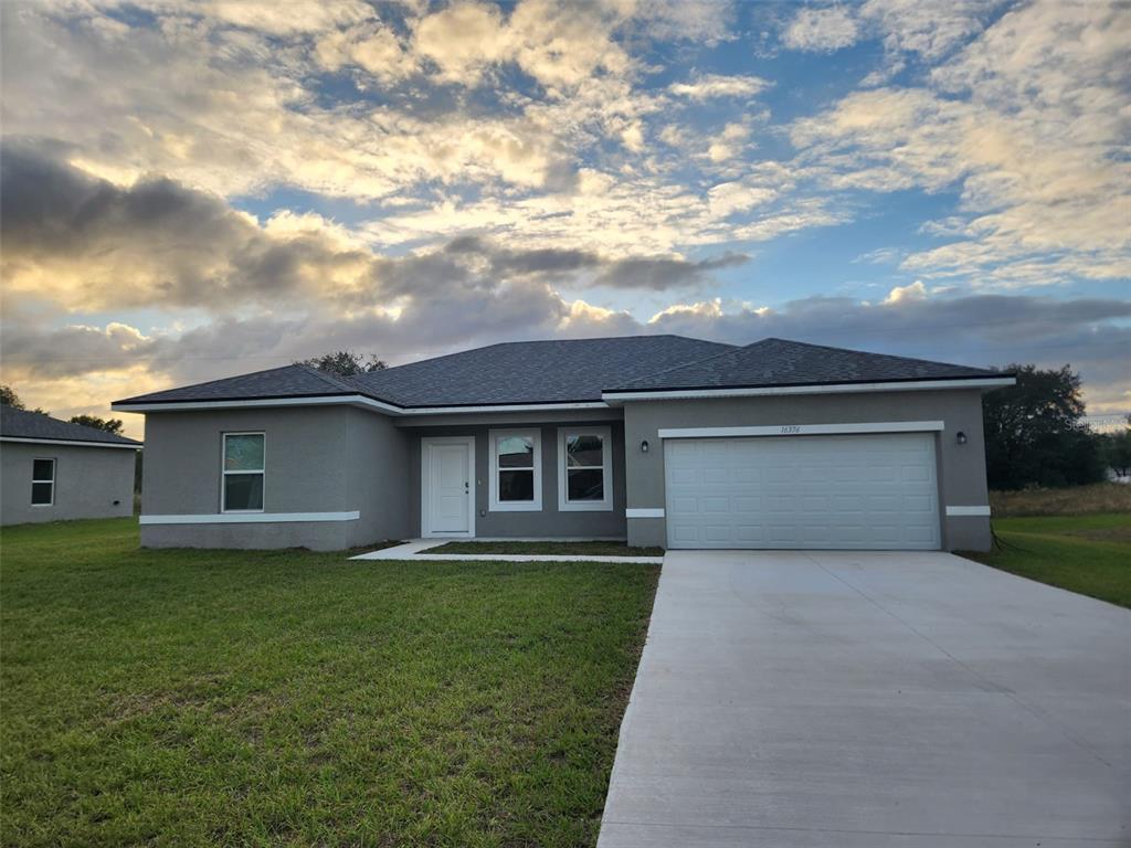 front view of house with a yard