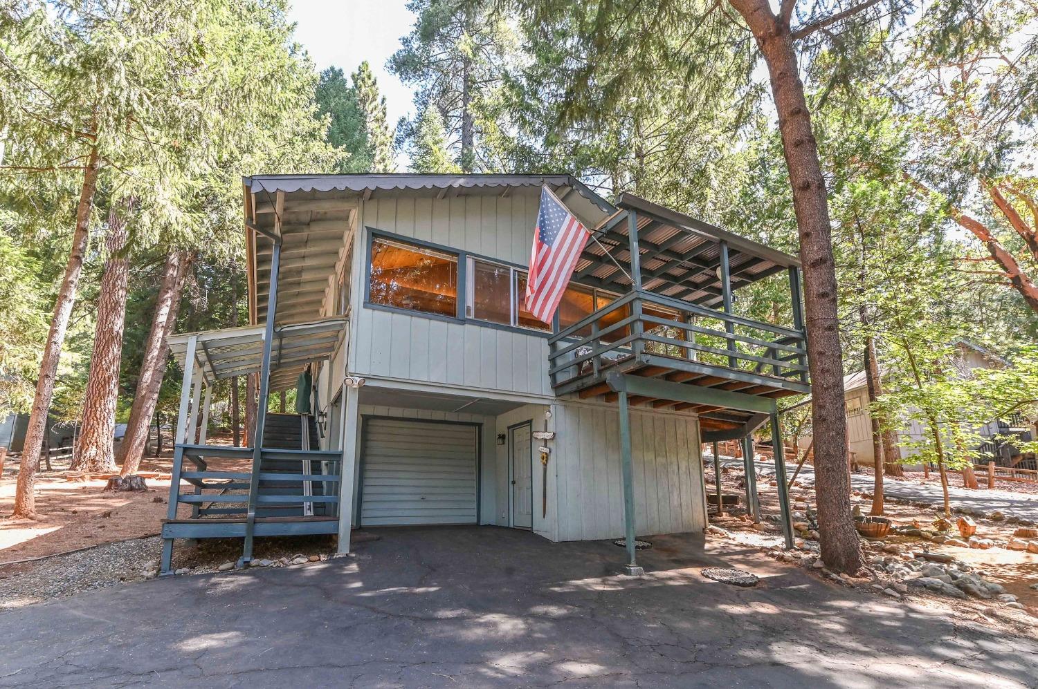 a front view of a house with a garage