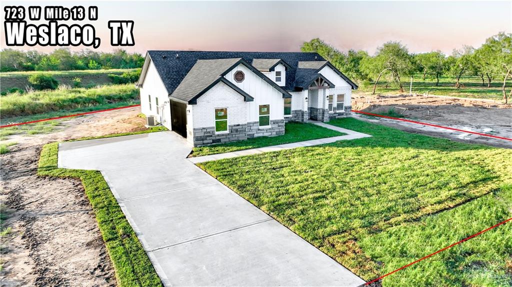 View of front of house with a lawn