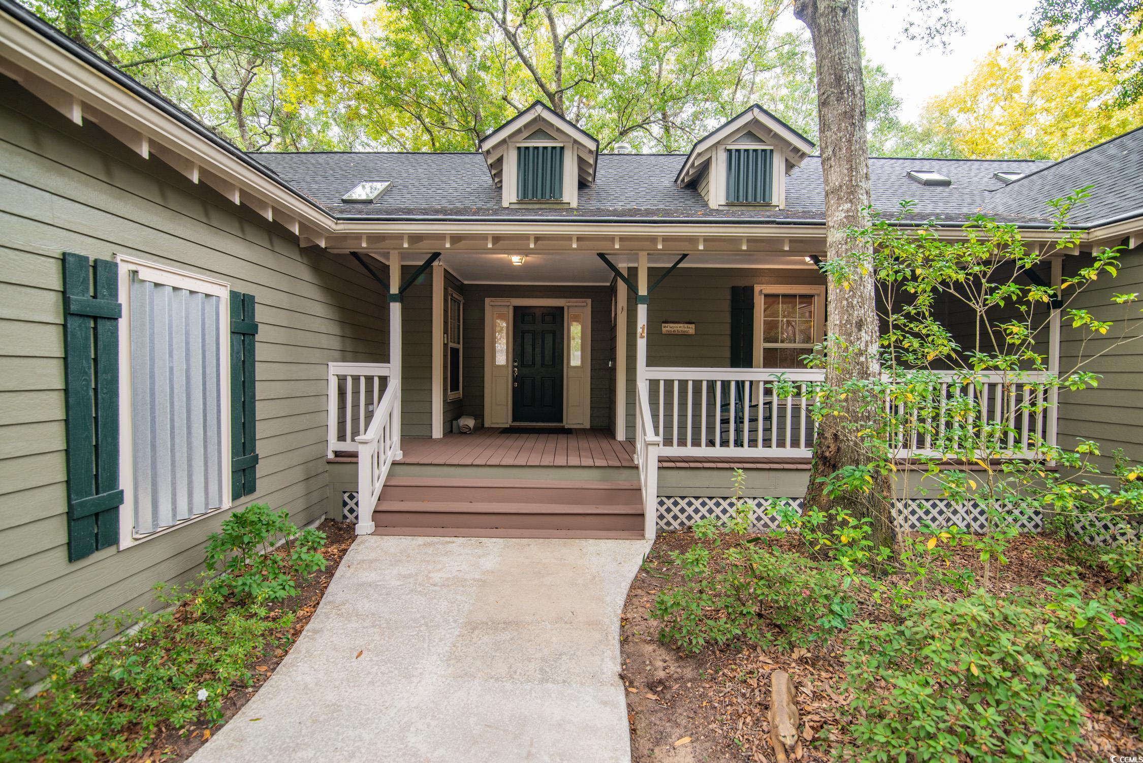 Exterior space with covered porch