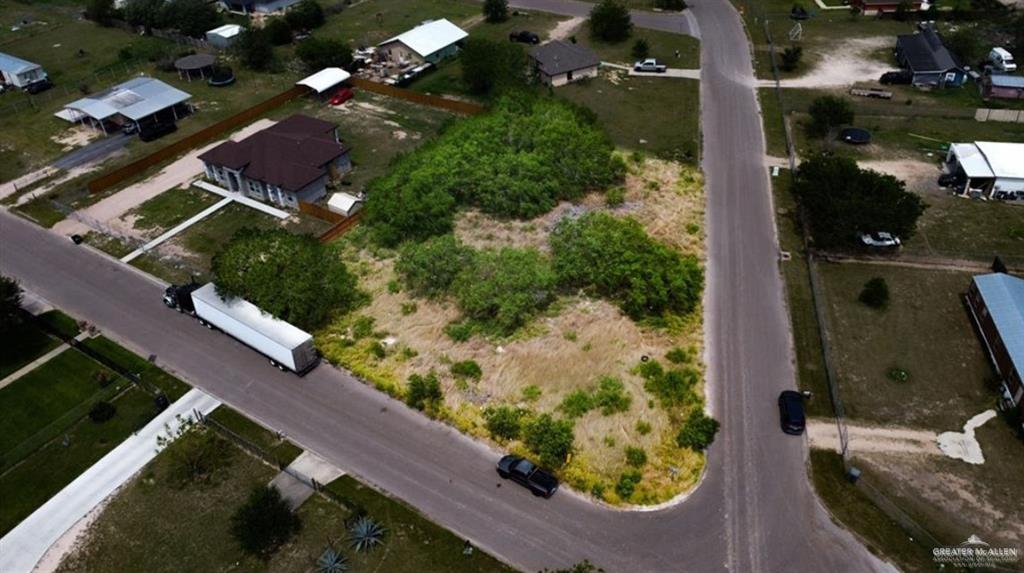 an aerial view of residential house with outdoor space