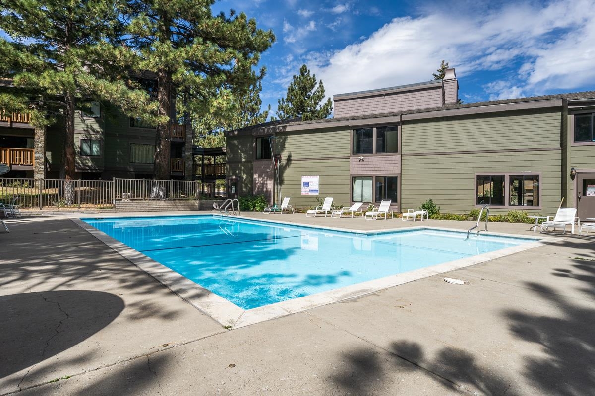 a view of a house with swimming pool