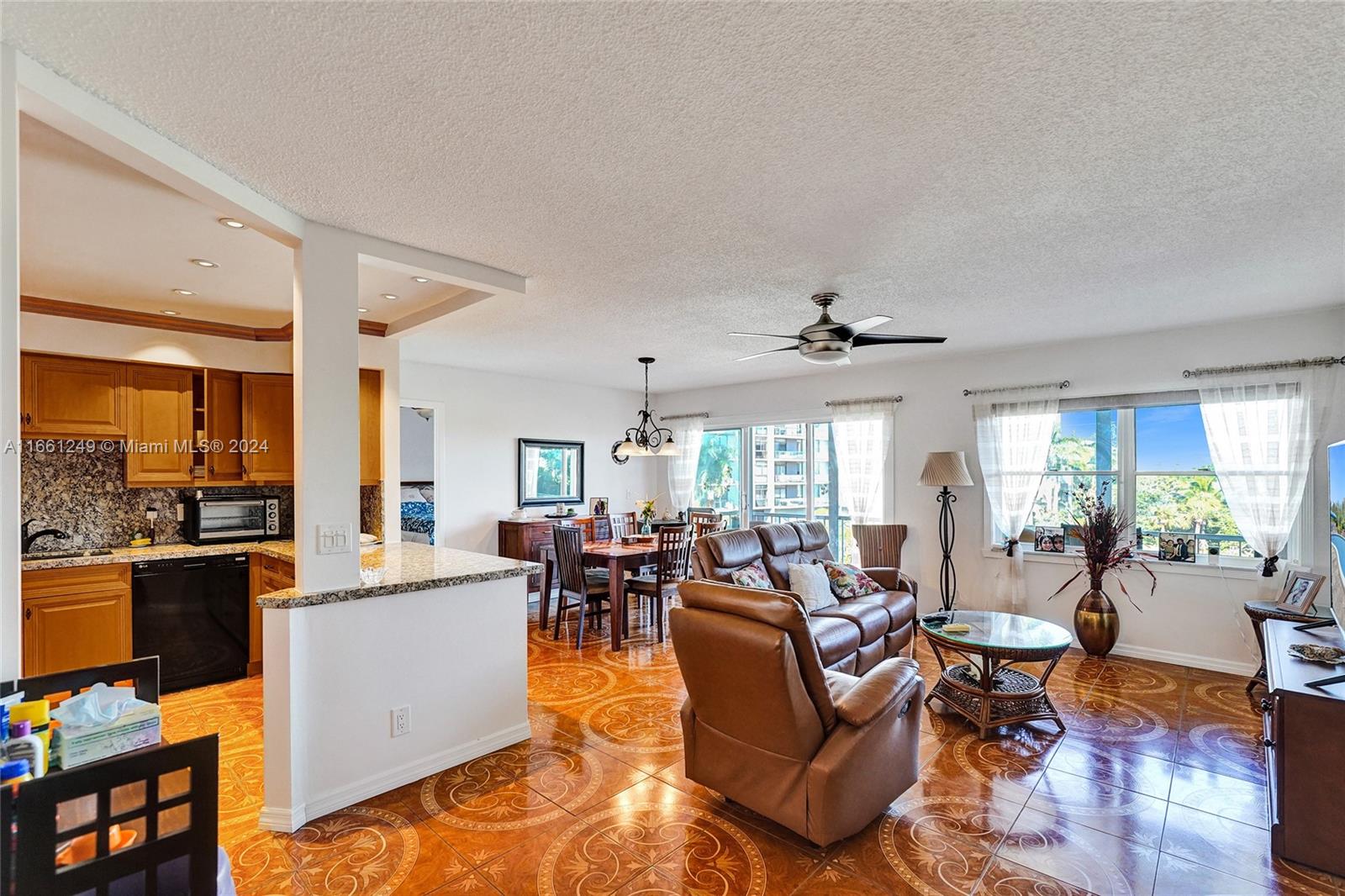 living and dining rooms with open concept kitchen makes life in Florida easy and convenient