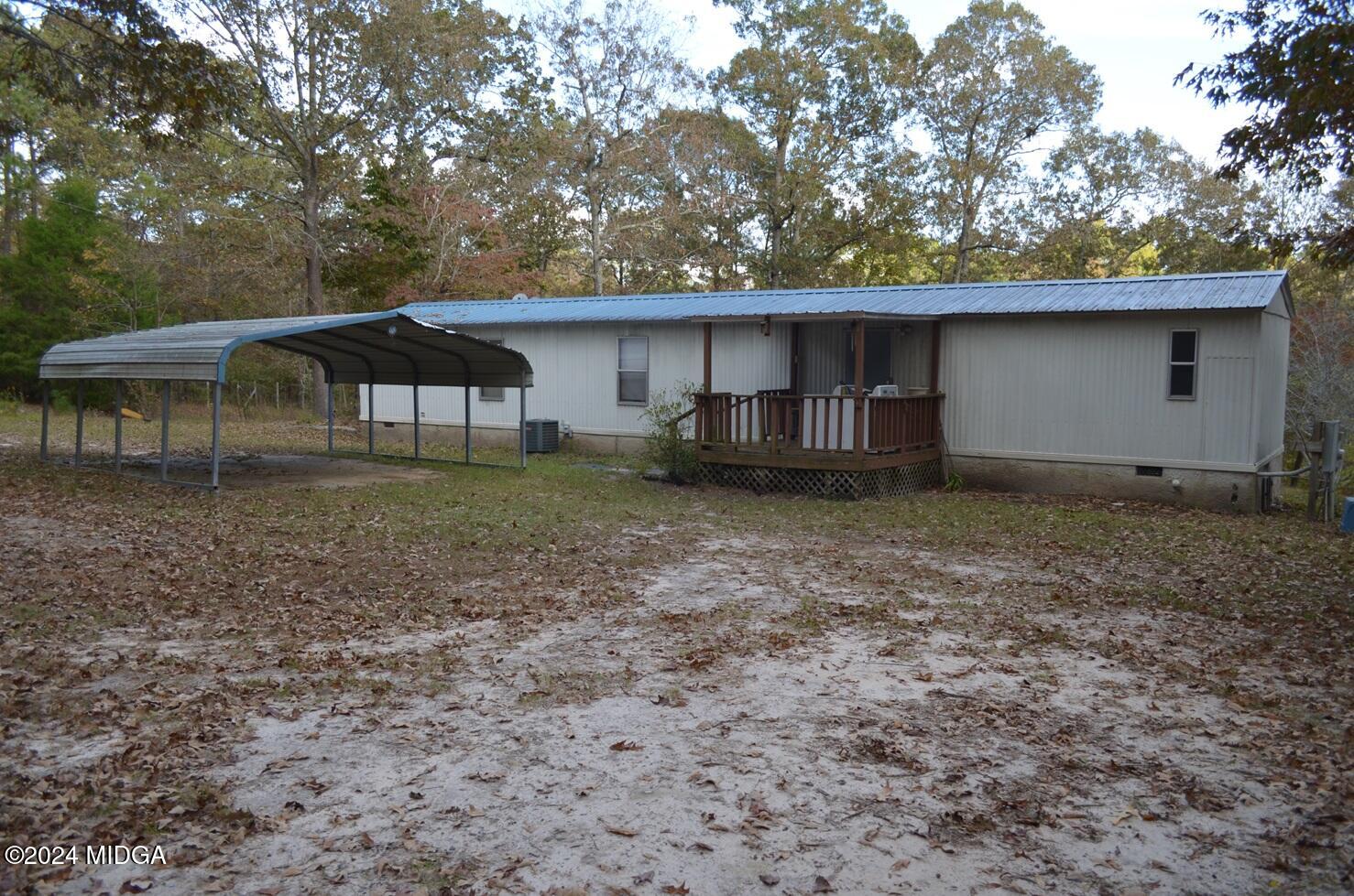 a house with trees in the background