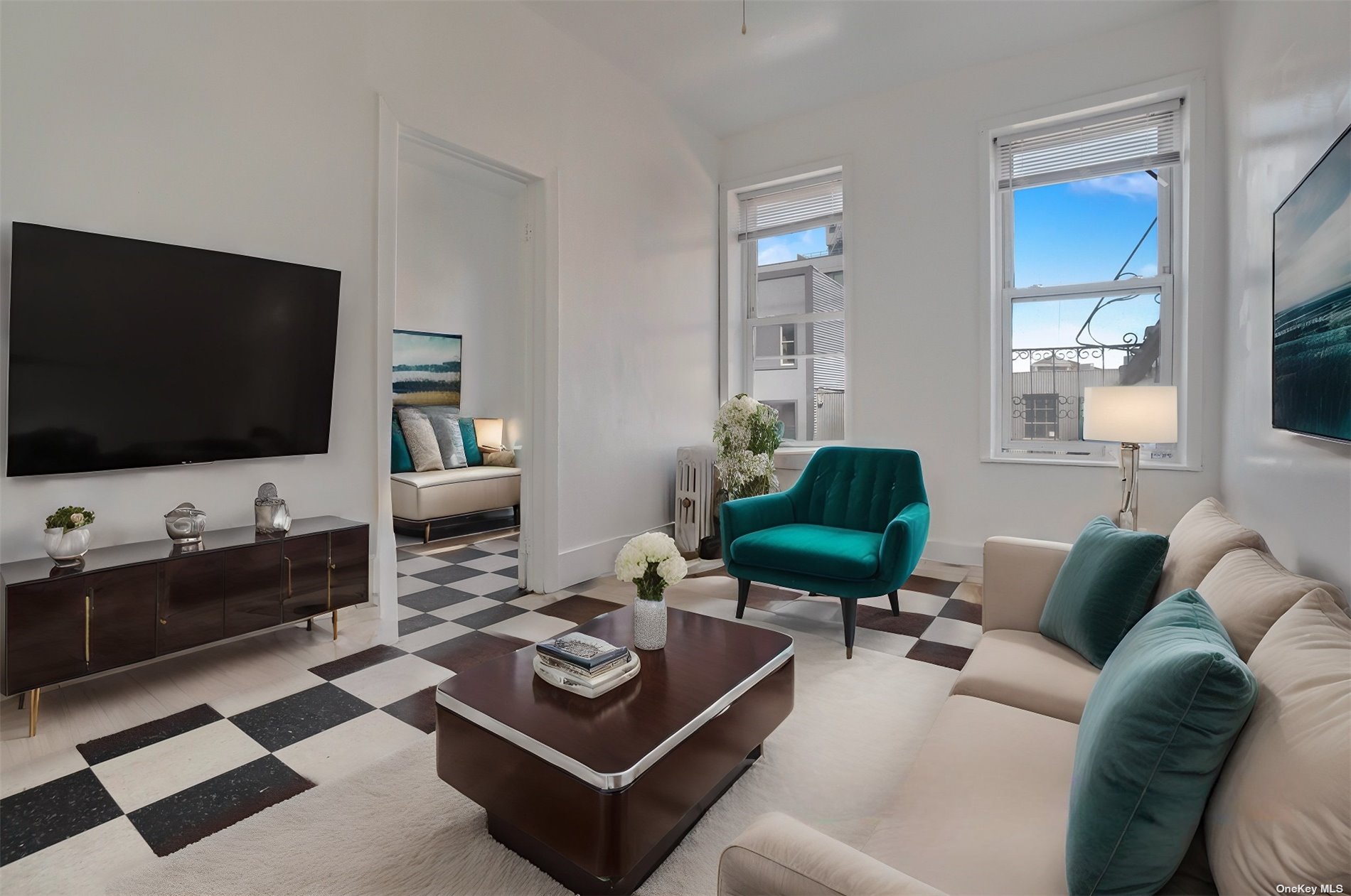 a living room with furniture and a flat screen tv