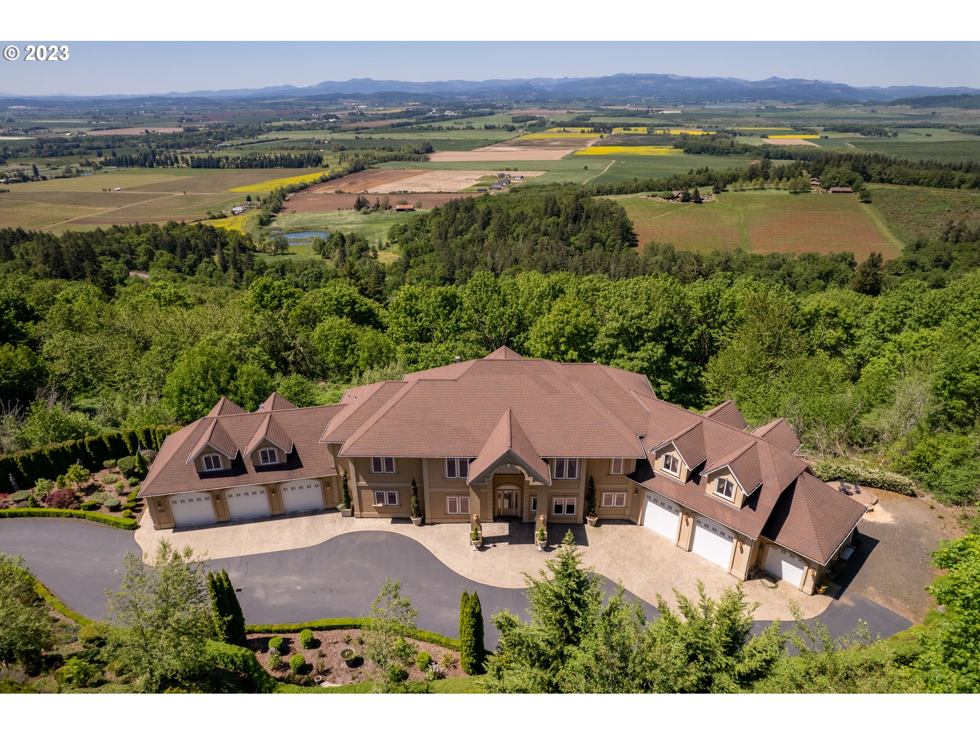 a view of house with outdoor space and river