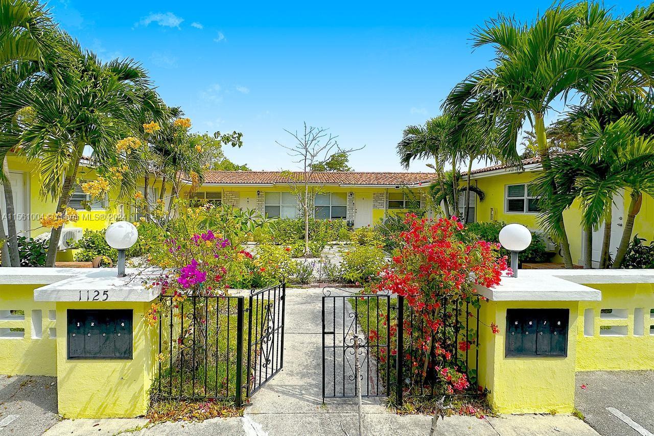 a front view of a building with an outdoor space