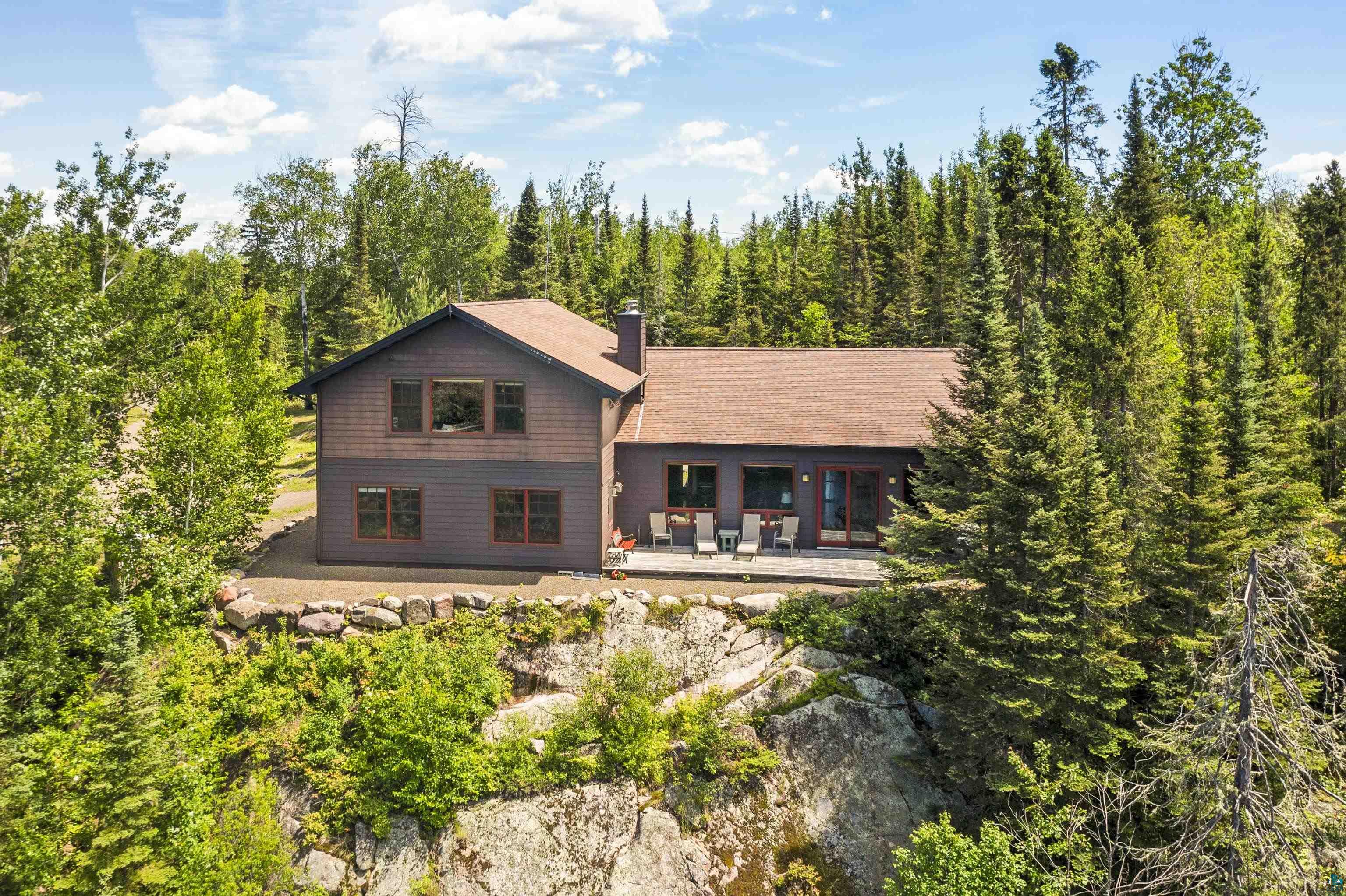 Rear view of house with a patio