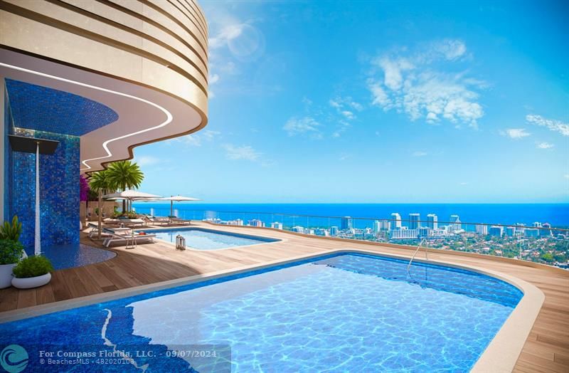 a view of a swimming pool with an outdoor seating and a yard