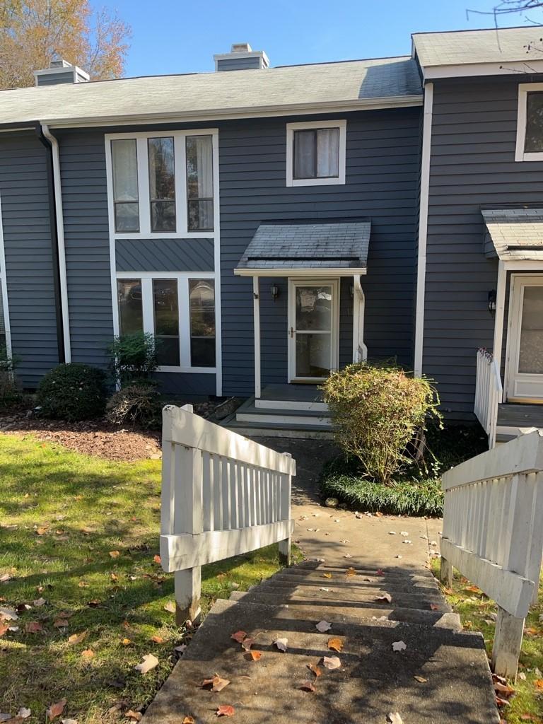 a front view of a house with porch