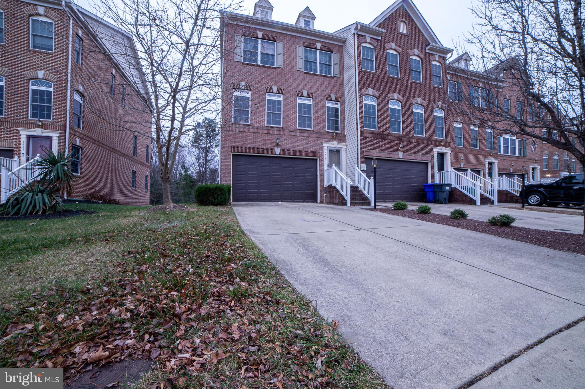 a view of a building with a yard