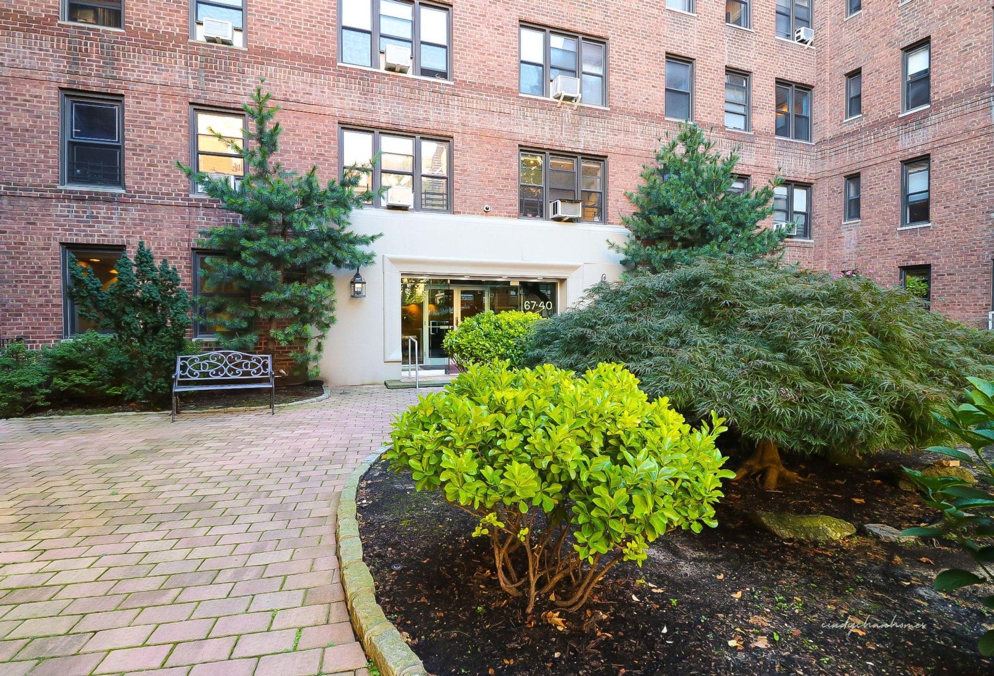 a front view of a multi story residential apartment building