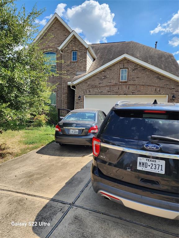 a car parked in front of a house