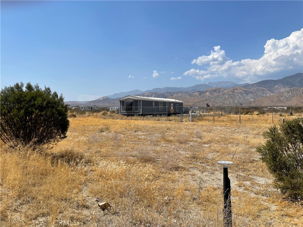 a view of a lake with a building in the background