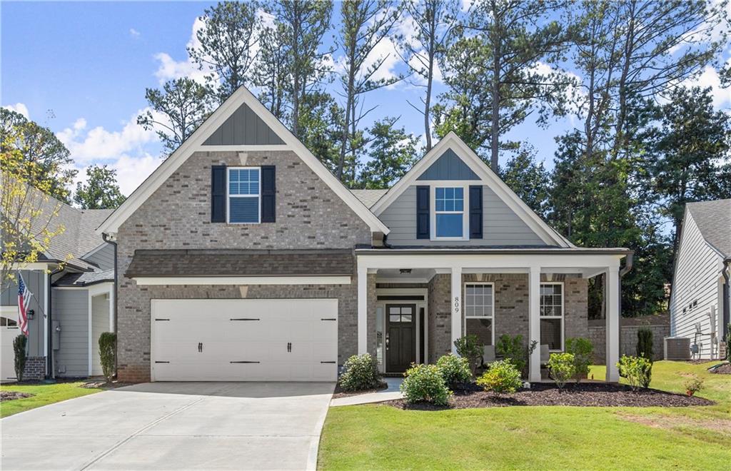 a front view of a house with yard