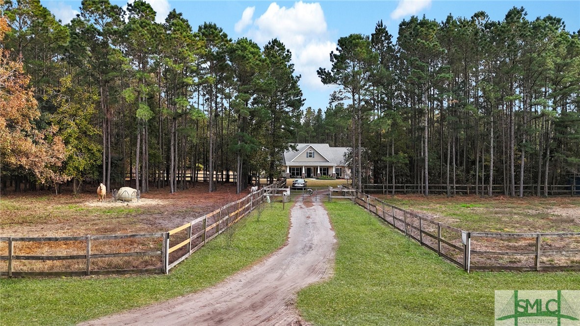 Entranceway from the road.  Gated entrance.  Pastu