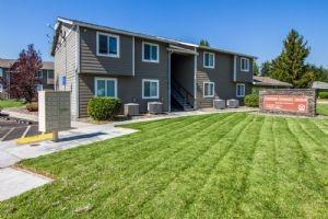 a front view of house with yard and outdoor seating