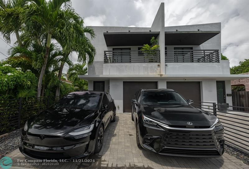 a car parked in front of a house