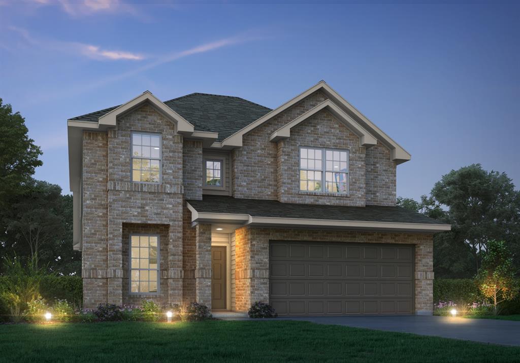 a front view of a house with yard