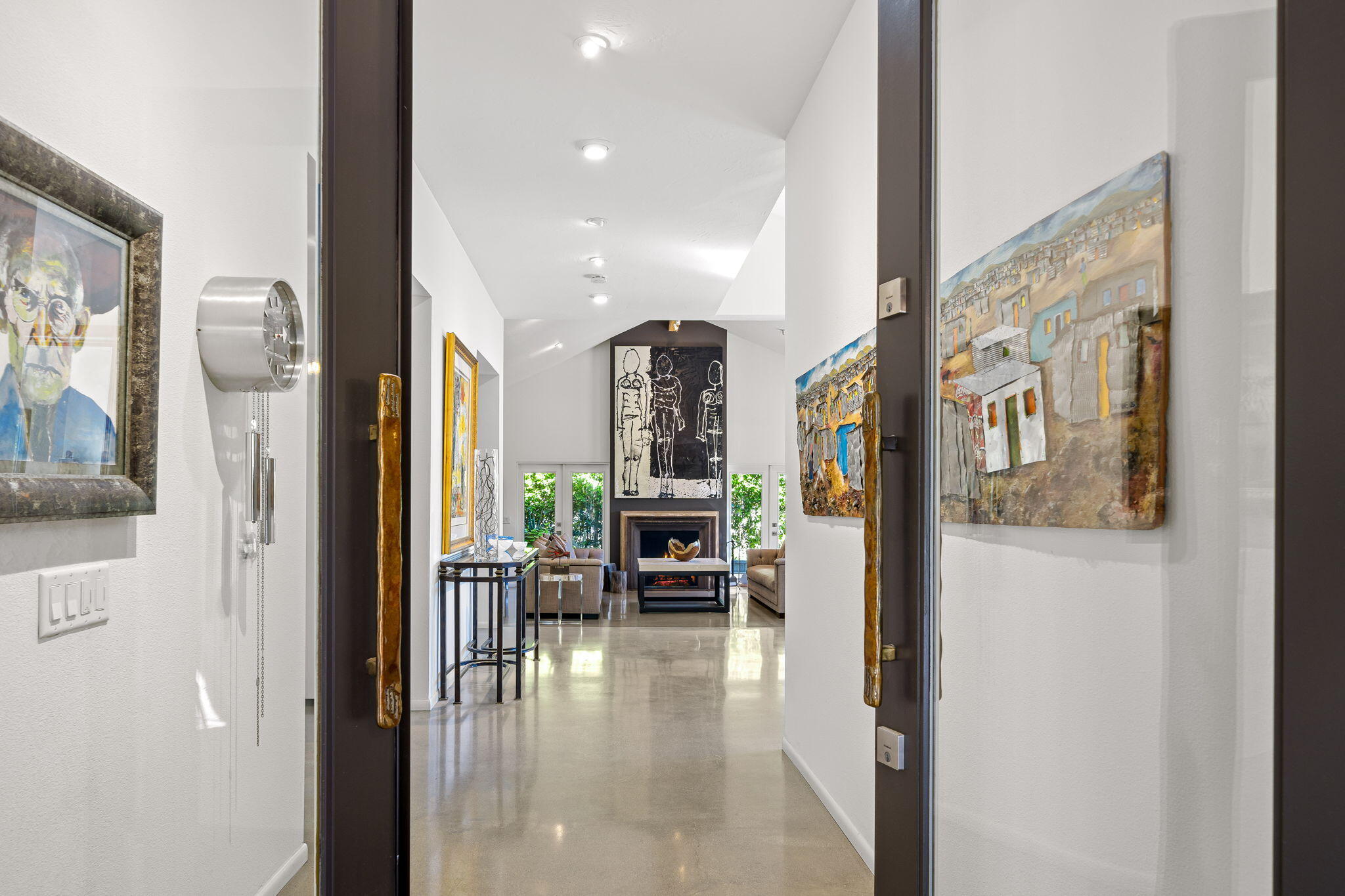 a view of living room with furniture and chandelier