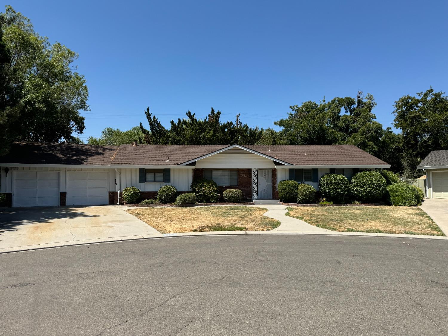 a house with yard in front of it